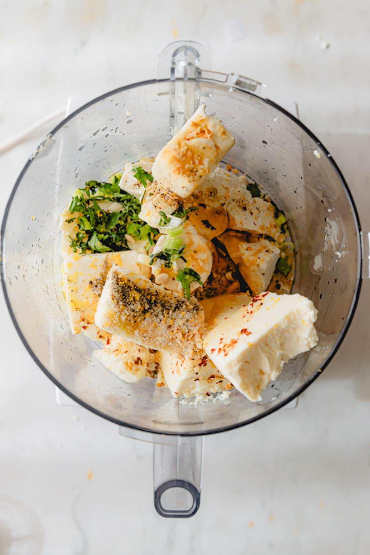 All ricotta cheese dip ingredients in a food processor. 