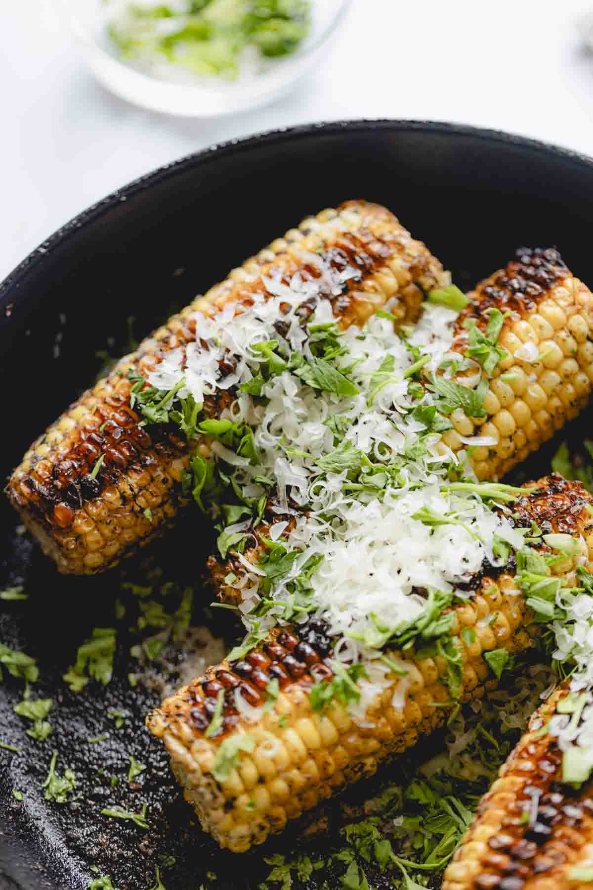 Skillet charred corn in a cast iron skillet.