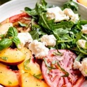 A close-up mindset of peach caprese salad.