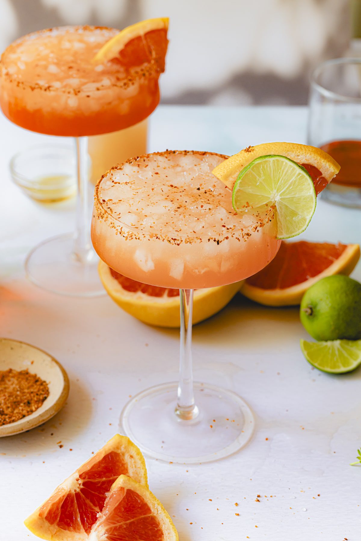 An Aperol Paloma with limes and grapefruit.