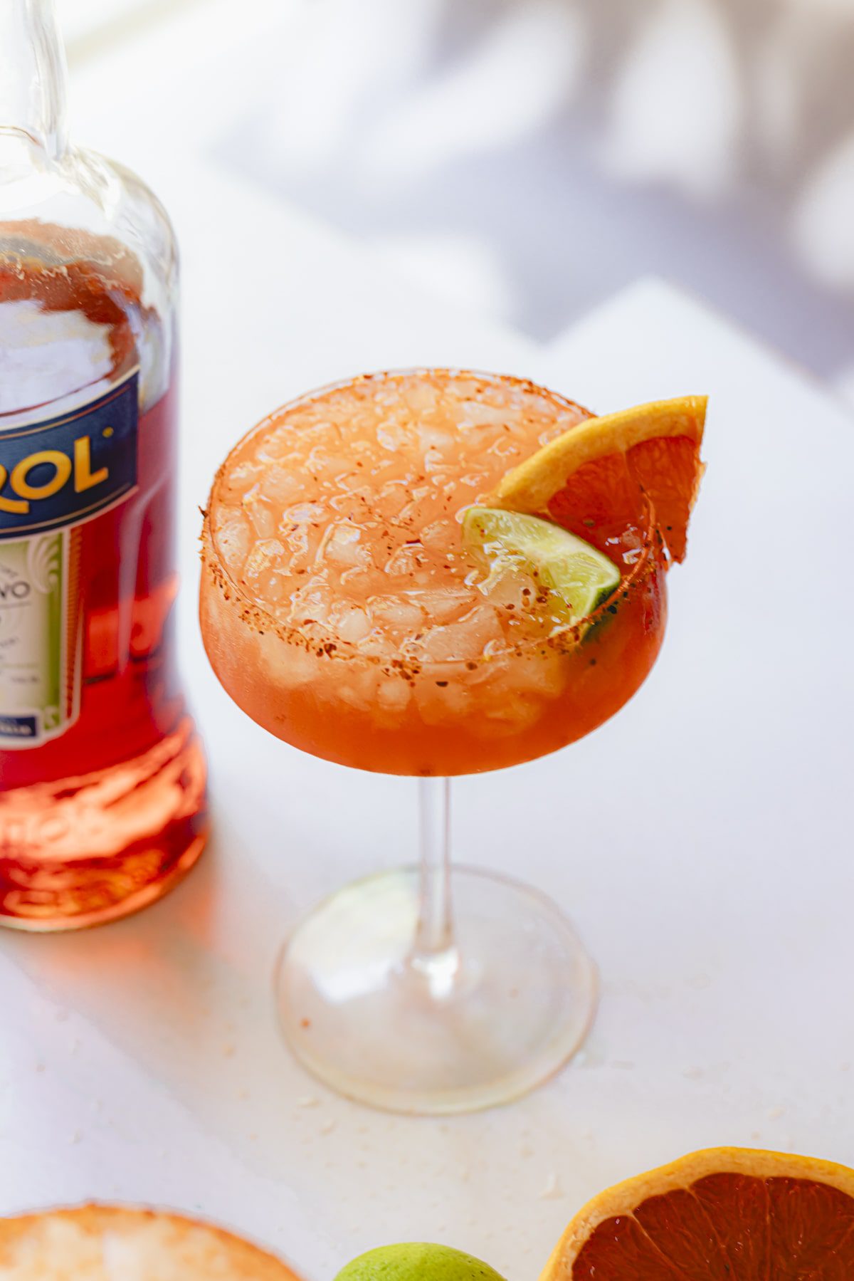 A close-up angled shot of an Aperol Paloma