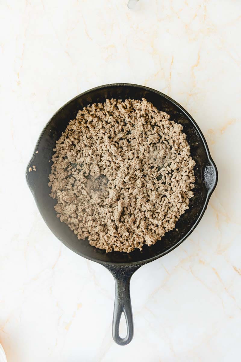 Browning ground beef in skillet. 