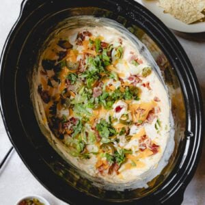 Jalapeno popper dip in a crockpot.