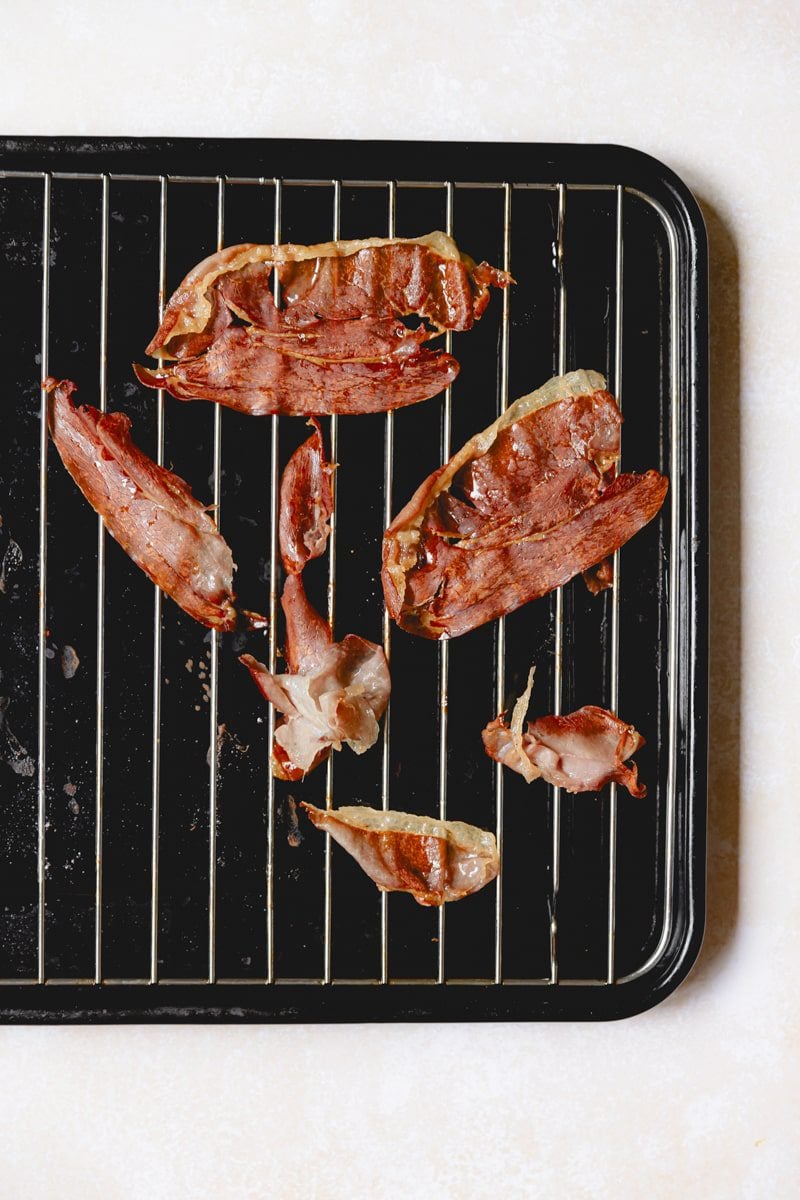 Crispy prosciutto on a sheet tray. 