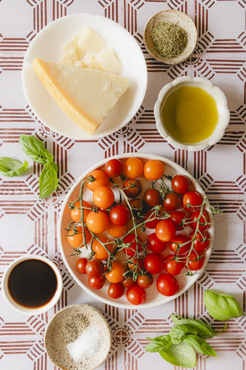 Ingredients for a marinated Italian tomato salad. 