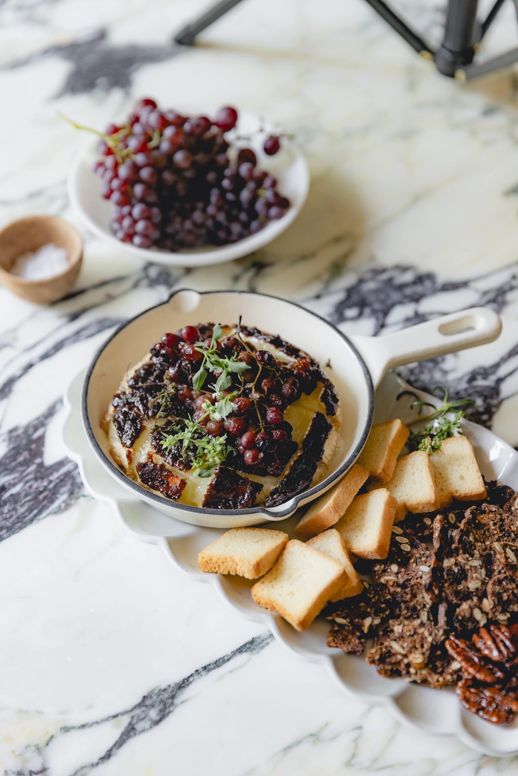Baked brie and fig jam served with crackers. 