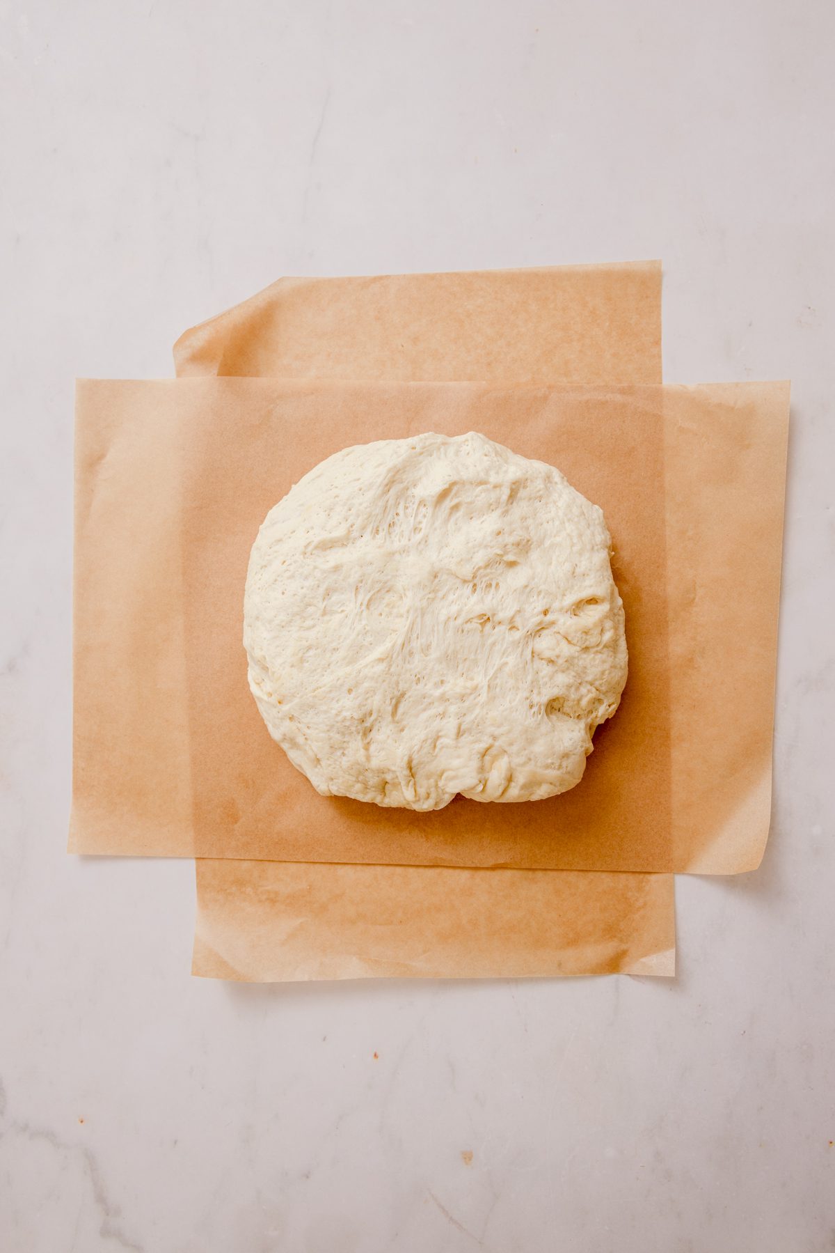 Dough on parchment paper.