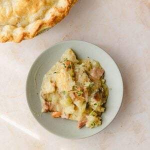 Ham pot pie served in a shallow bowl.