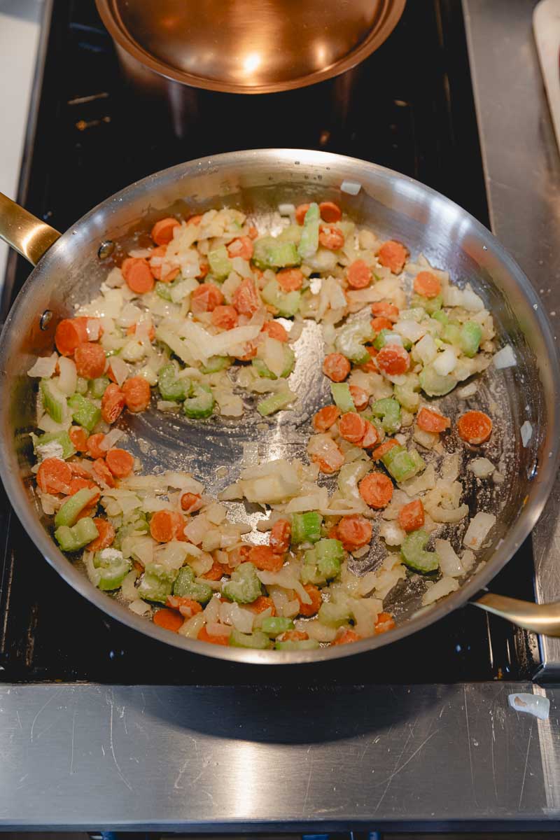 Flour and butter added to sautéing veggies.