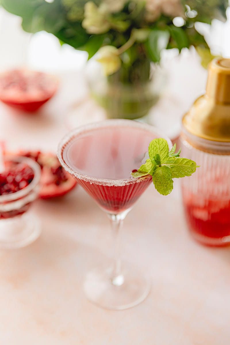 Pomegranate martini with a sugared rim.