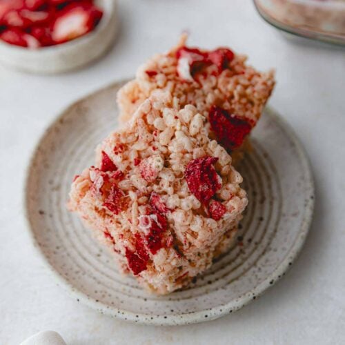 Plated pink Rice Krispie treats.